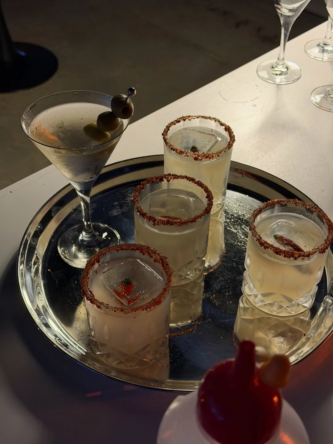 Cocktails arranged on a serving tray