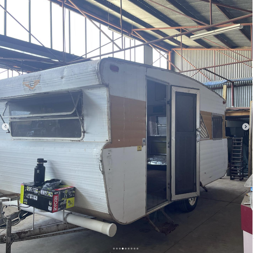Rear entrance of the vintage caravan during restoration